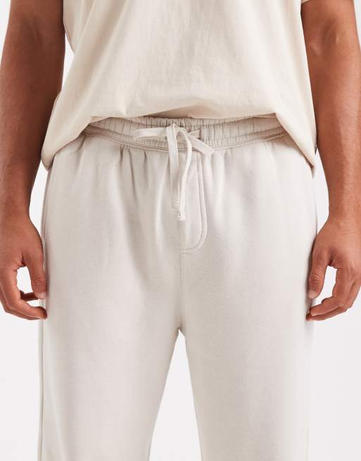 Cotton On baggy cuffed track sweatpants in bone