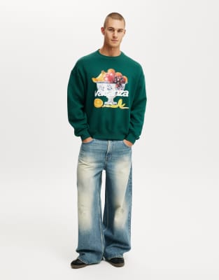 Cotton On Box fit graphic crew sweater in evergreen / prodizione locale