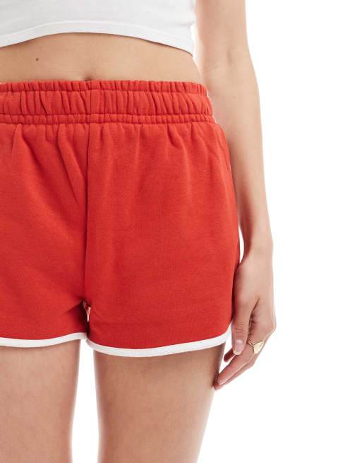 Cotton On dolphin hem micro mini shorts in red poppy | ASOS