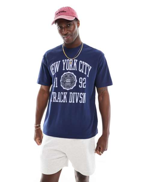 Cotton On - Indigoblå T-shirt med 'NY'-træningsgrafik med college-design i løstsiddende pasform - view 1