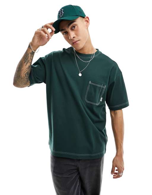 Cotton On – Kastig geschnittenes T-Shirt in Tannengrün mit Tasche und Ziernähten 