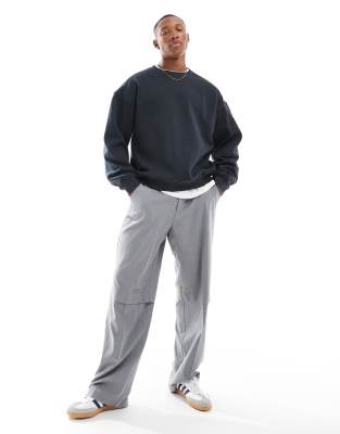 Cotton On – Kastiges Fleece-Sweatshirt in verwaschenem Schwarz mit Rundhalsausschnitt - view 1