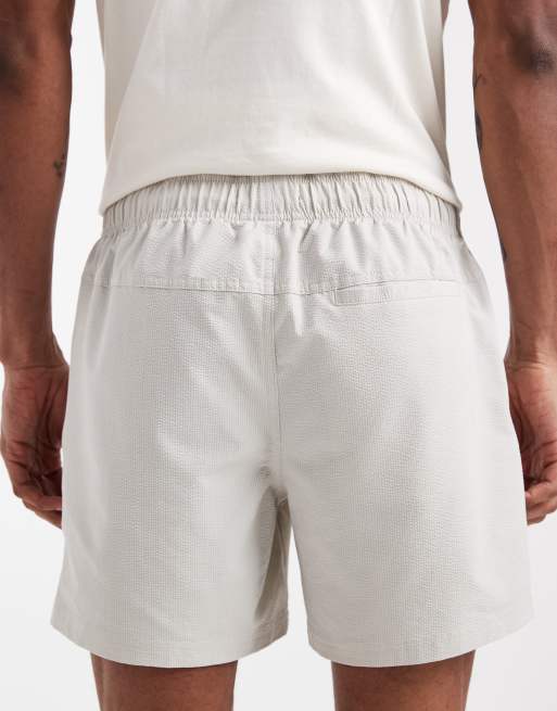 Cotton On – Ljusbeige, stretchiga badshorts, 5 av 5