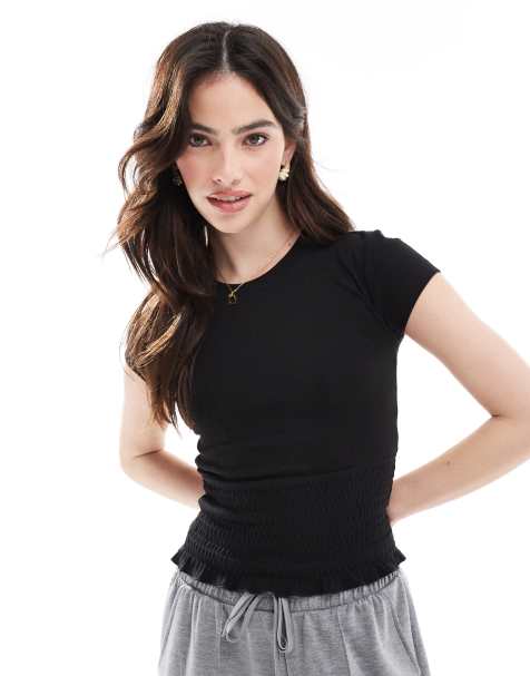 Cotton On – Pia – Gesmoktes, kurzärmliges Oberteil in Schwarz - view 1