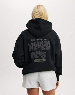 Cotton On - Plush - Hochwertiger Kapuzenpullover in Schwarz mit Print