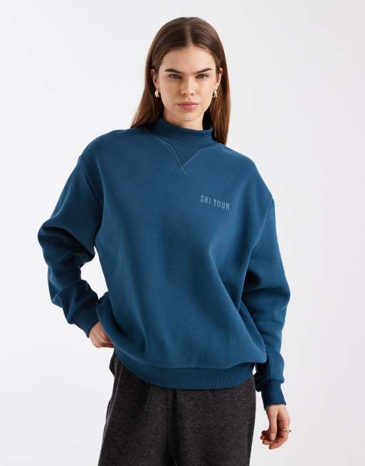 Cotton On plush mock neck sweatshirt with ski tour graphic in tidal teal, 2 of 4