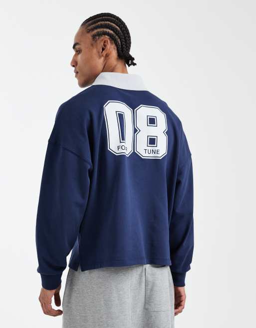 Cotton On - Polo corta in pile blu navy con grafica, 3 di 5