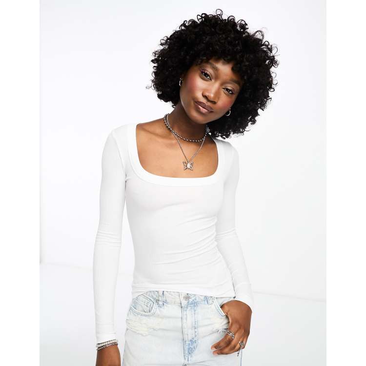 white scoop neck long sleeve top