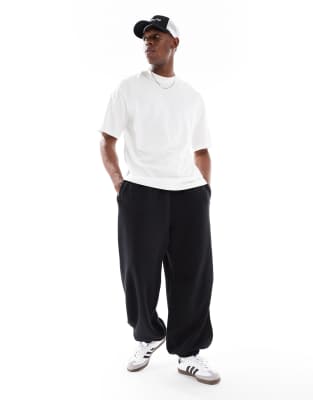 Cotton On Super baggy cuffed track pant in black