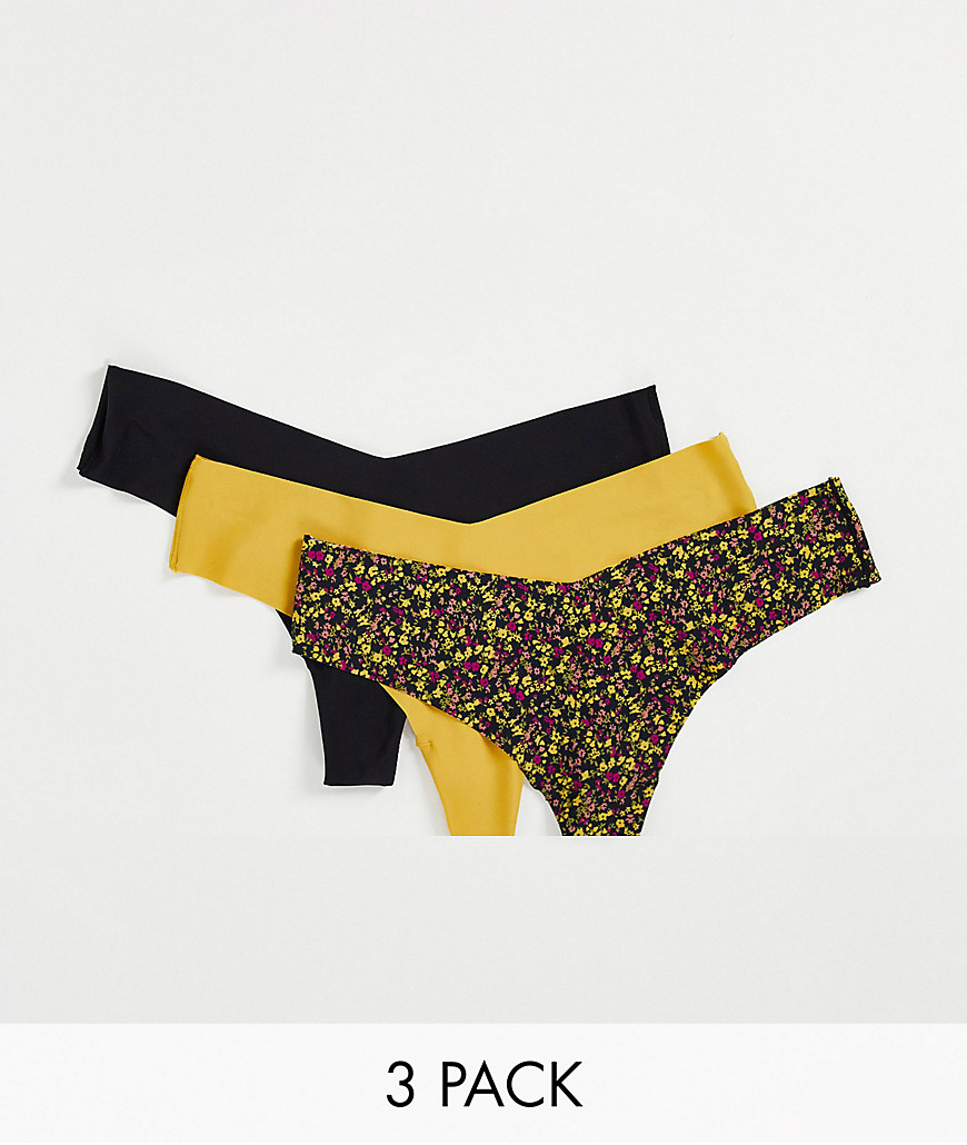 Cotton: On 3-pack invisible high cut thongs in multi