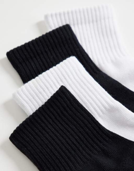 CottonOn 4 pack quarter crew socks in black and white, 2 of 3