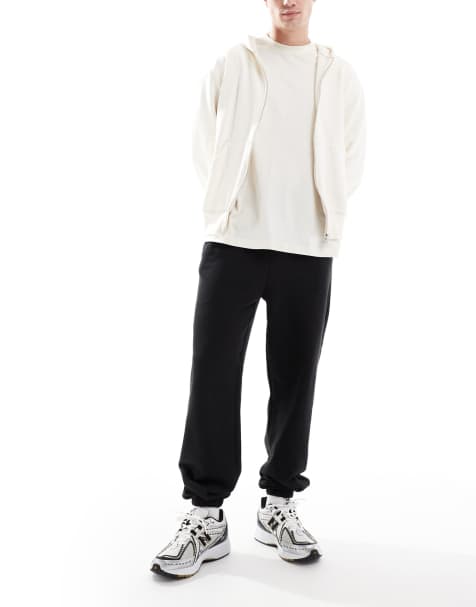 Cotton:On Baggy cuffed track pant in black - view 1