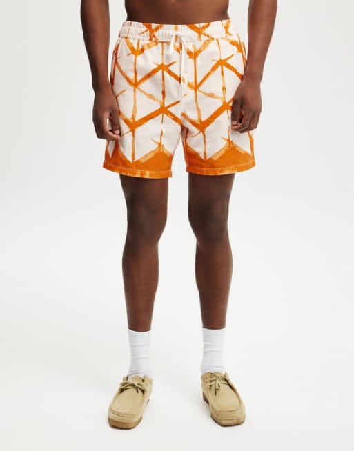 Cotton:On Easy short in orange abstract print
