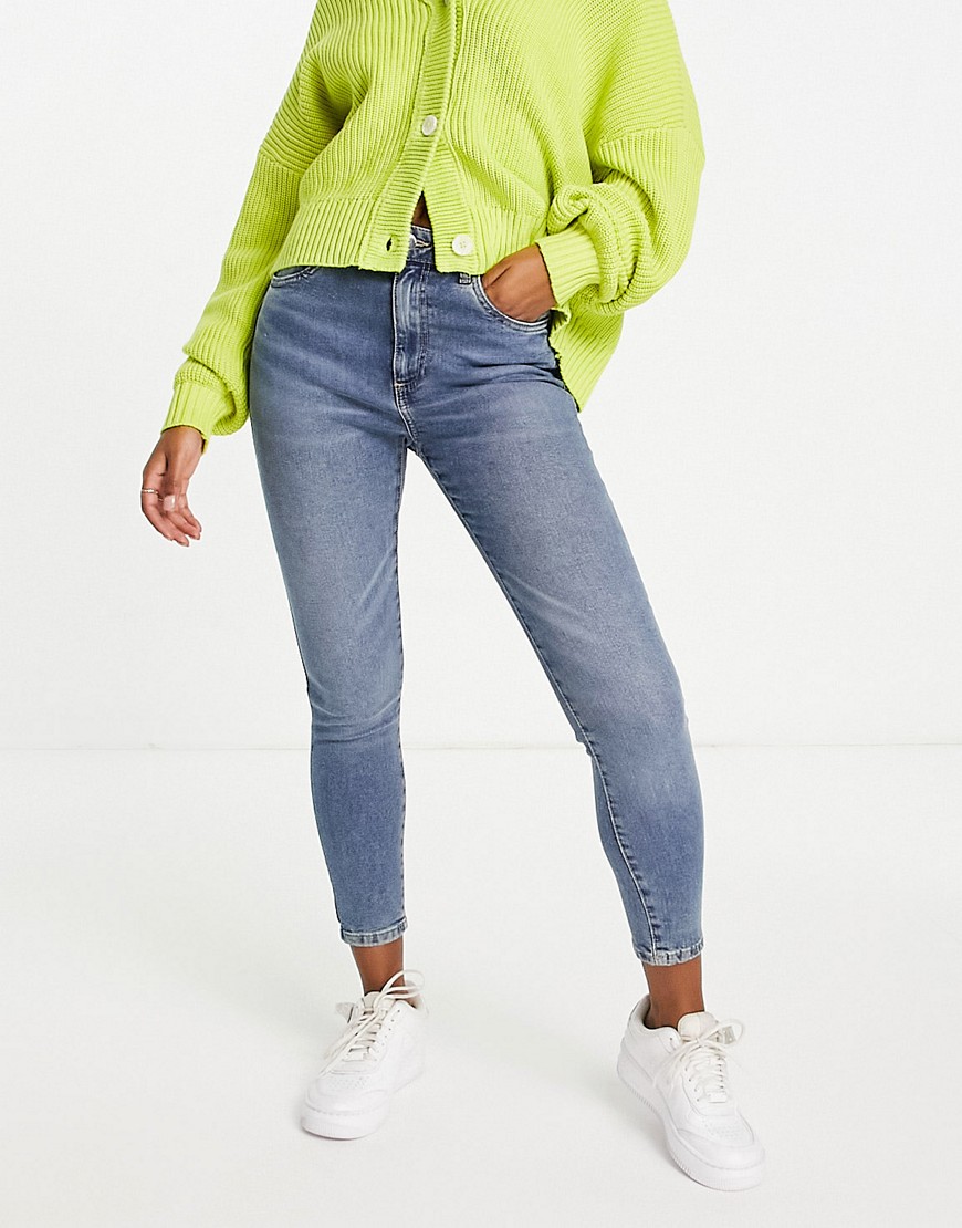 Cotton: On high waist skinny jean in mid wash blue