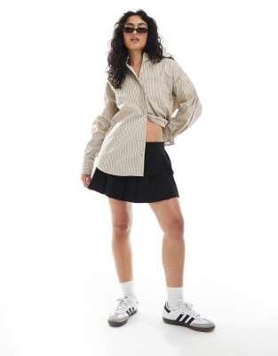 Cotton On - Luis - Mini-jupe plissée double épaisseur - Noir