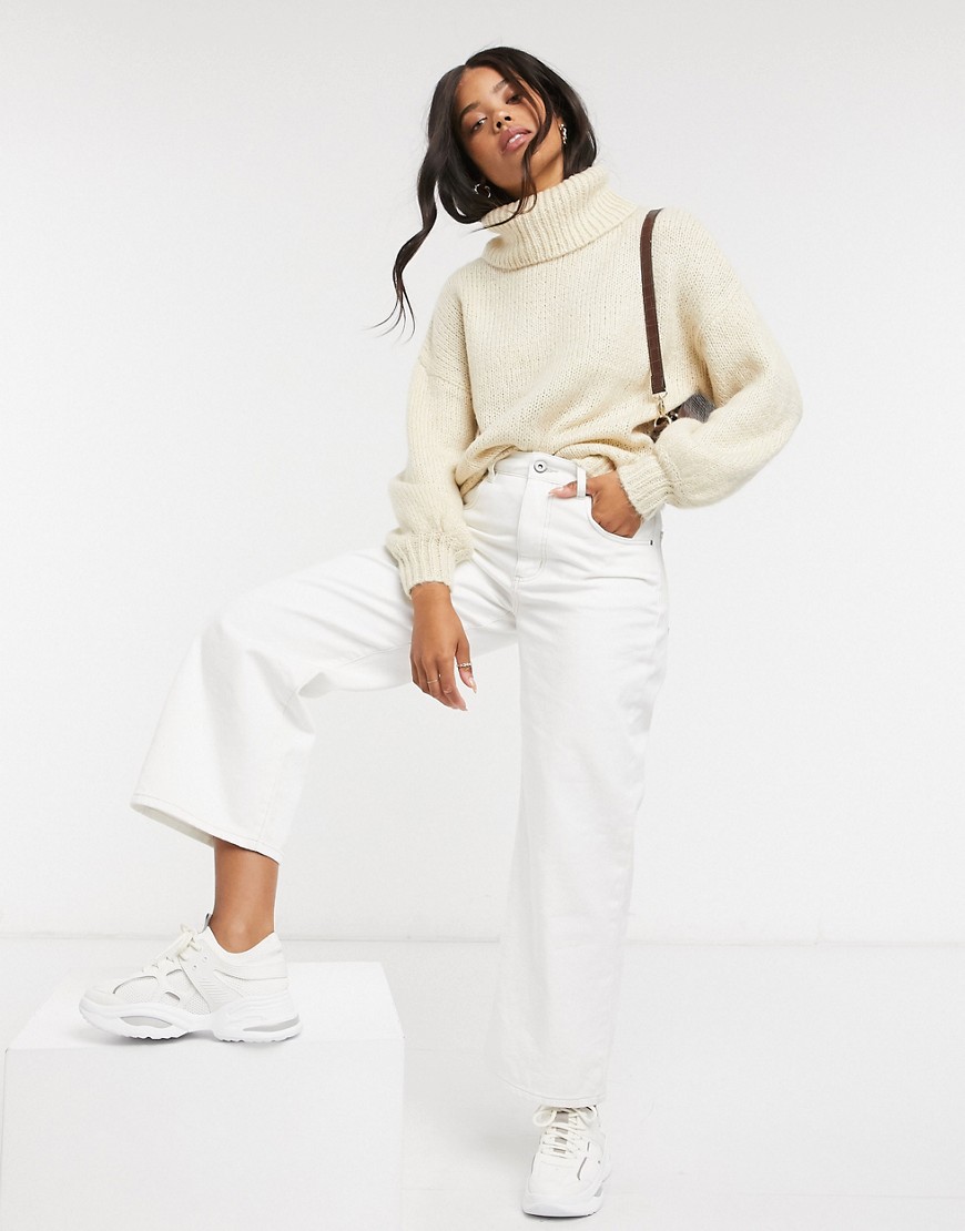 Cotton: On roll neck knitted sweater in cream-White