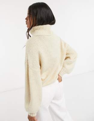 cream knitted roll neck jumper