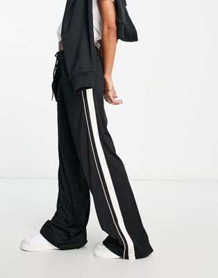 Cotton:On wide leg track pant with side panel in black | ASOS