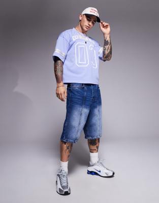 Courtside athletic top with contrast stripe detail in blue