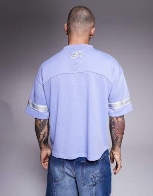 Courtside athletic top with contrast stripe detail in blue