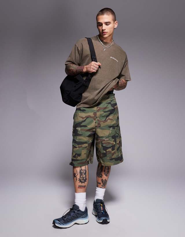 Courtside baggy distressed cargo short in green camo | ASOS