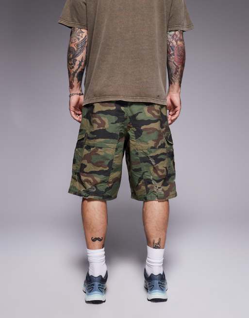 Courtside baggy distressed cargo shorts in green camo