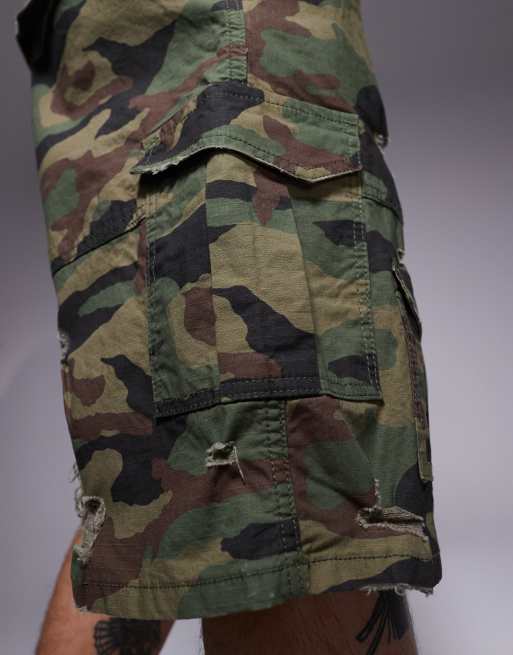 Courtside baggy distressed cargo shorts in green camo
