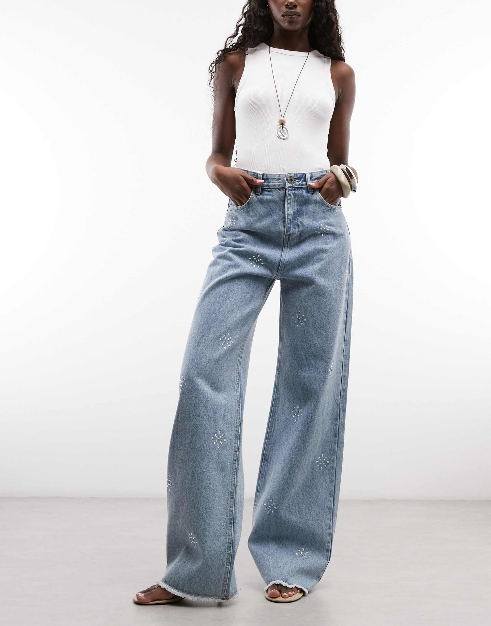 courtside baggy wide leg embellished jeans with raw hem in light wash blue