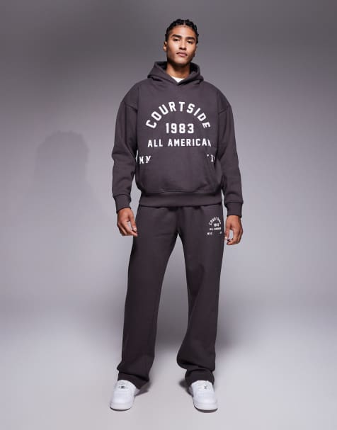 Courtside - Brun sæt med oversized pullover-hættetrøje og joggingbukser med college-print - view 1