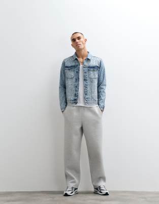Courtside Distressed Denim Jacket In Blue
