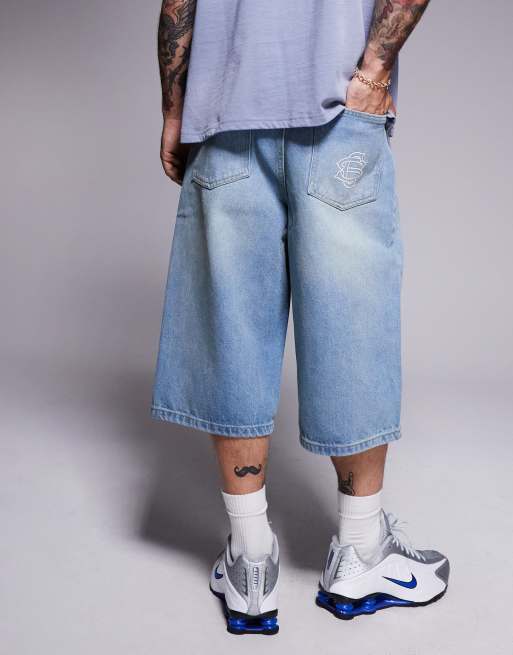Courtside - Ekstremt posede longline-jorts med broderi på baglommen i slidt brun vask, 2 af 5