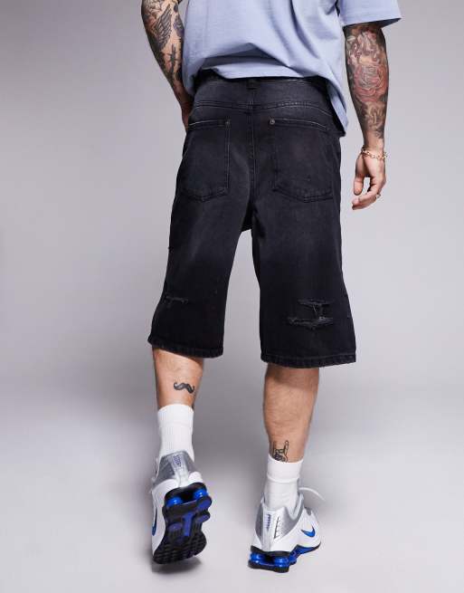 Courtside extreme distressed denim jorts in washed black