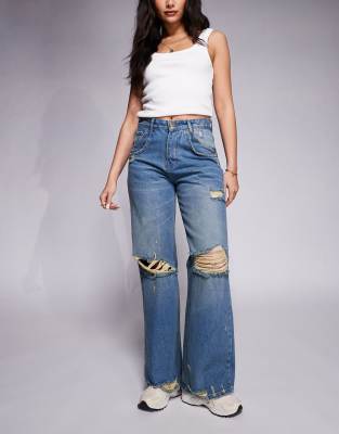 Courtside Courtside extreme distressed wide leg jean in washed blue