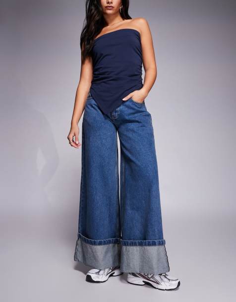 Courtside - Mellemblå forvaskede jeans i denim i oversized pasform med opsmøget sømkant - view 1