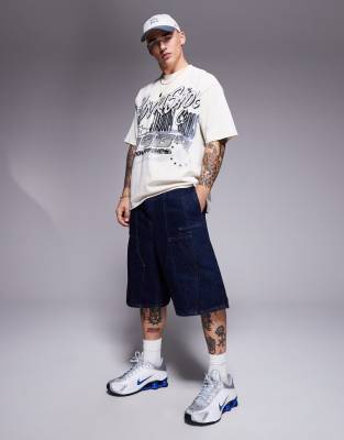 Courtside Courtside panel detail denim jort with back pocket logo embroidery in indigo-Blue
