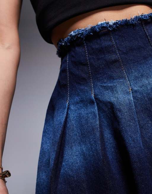 Courtside pleated denim mini skirt with stone wash detail in