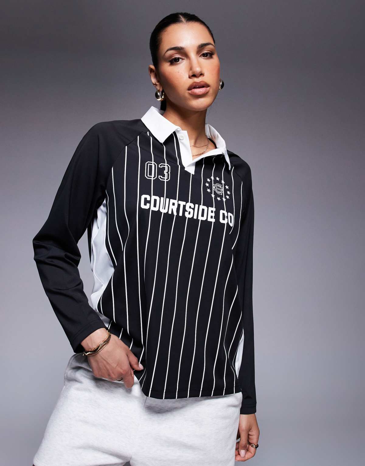 Courtside sports long sleeve logo detail panel top in black
