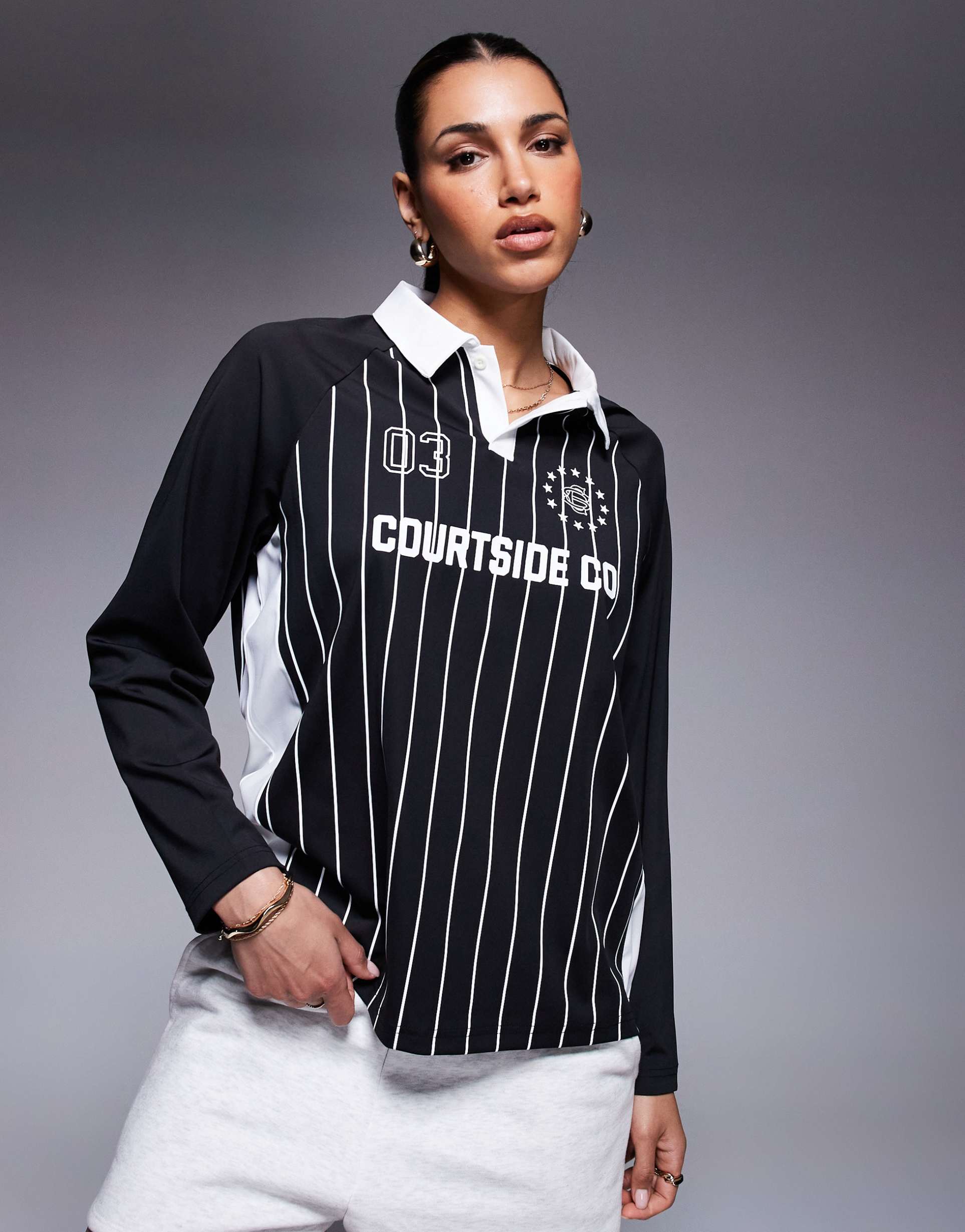 courtside sports long sleeve logo detail panel top in black