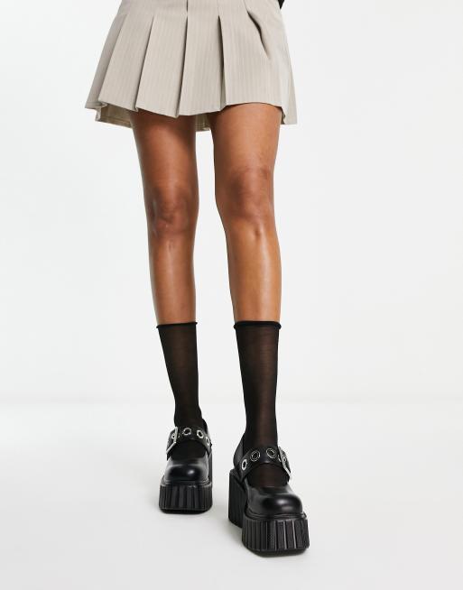 Creepers negros con plataforma plana y hebilla Survivor de Lamoda