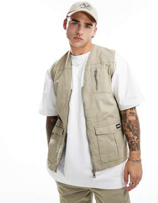 Criminal Damage cargo vest with army pockets in light khaki-Green