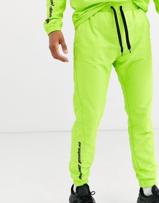 Neon green jogging on sale suit