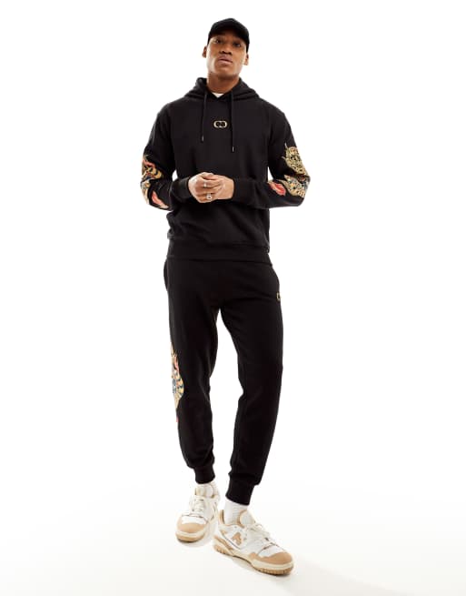 Criminal Damage dragon detail embriodery hoodie & joggers in black