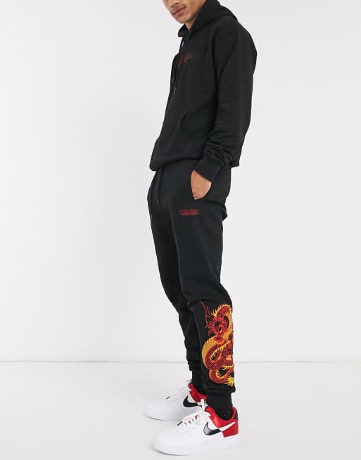 Criminal Damage dragon embroidered tracksuit in black