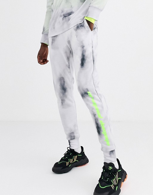 Criminal Damage joggers in tie dye with logo
