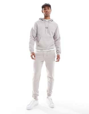 Criminal Damage logo joggers in grey