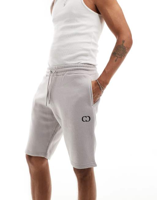 Criminal Damage logo short in light grey