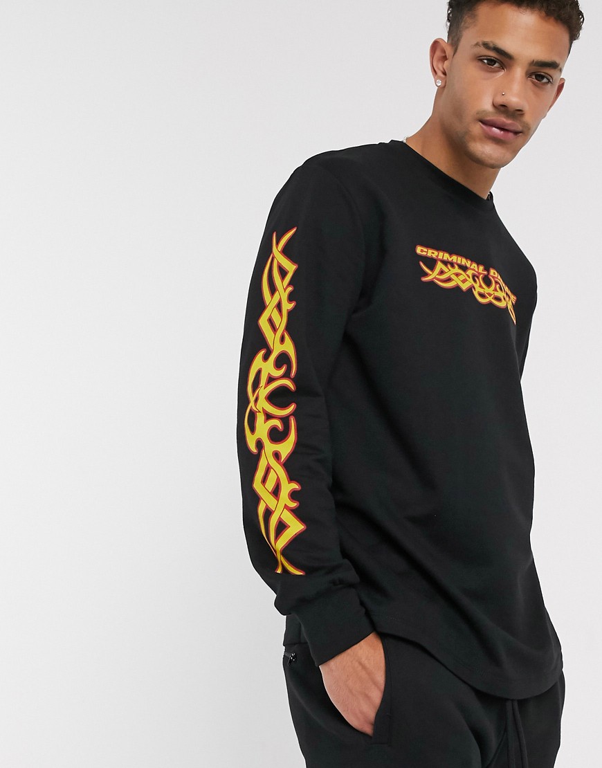 Criminal Damage long sleeve top with yellow tattoo print in black