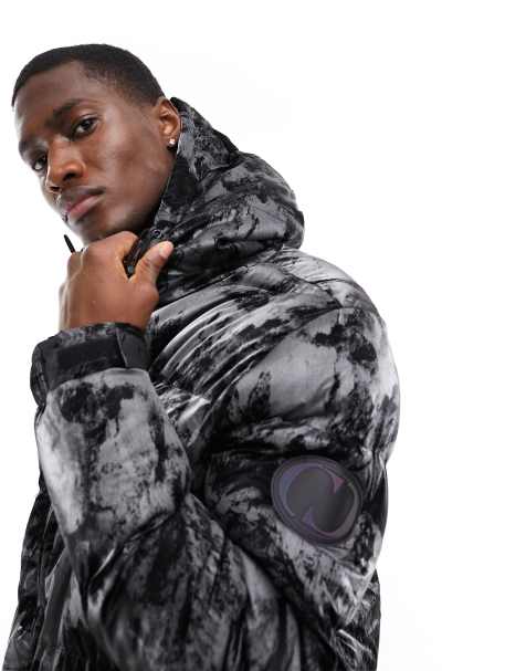 Criminal Damage puffer jacket with all over graphic print in black - view 1
