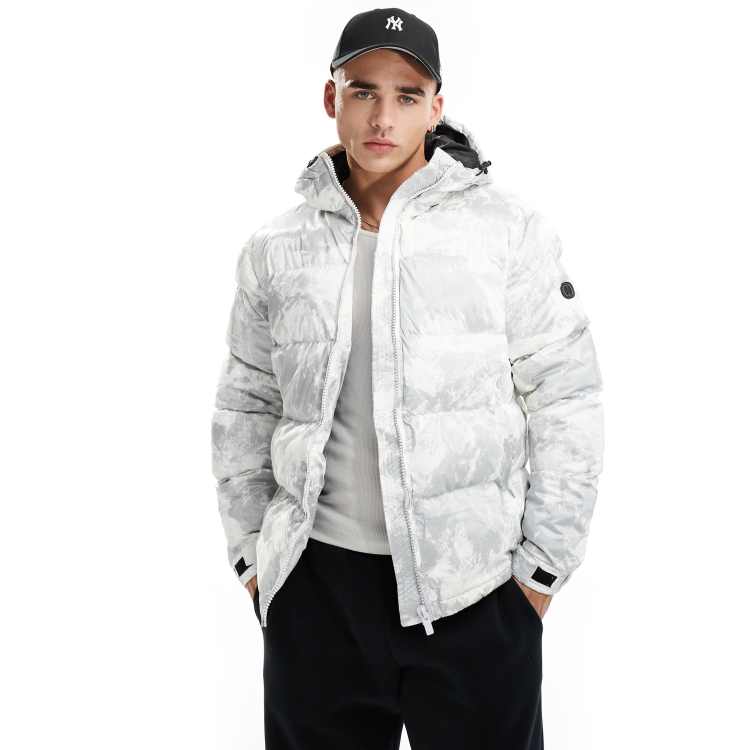 Criminal Damage puffer jacket with all over graphic print in white ASOS