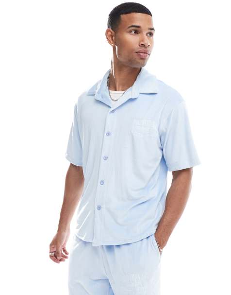 Criminal Damage varsity polo shirt in blue - view 1